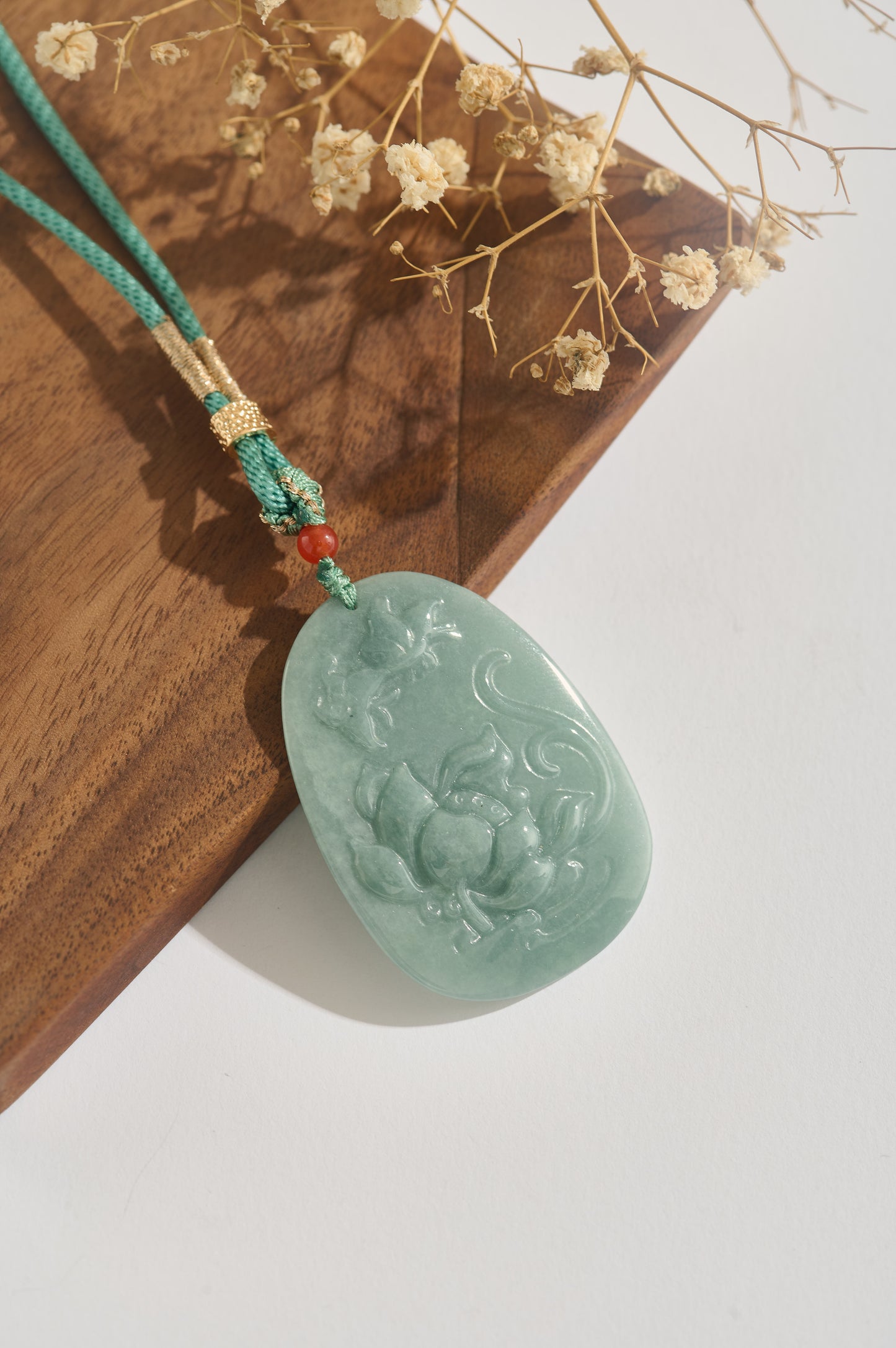 Lotus Serenity – Hand-Carved Jade Pendant Necklace with Silk Cord & Gold Details