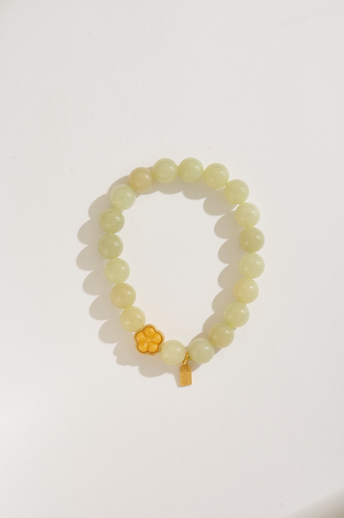High-Quality Natural Hetian Jade Bracelet – Yellow Jade Beads with Gold-Plated Flower Charm – Handmade Lucky Jade Jewelry for Women