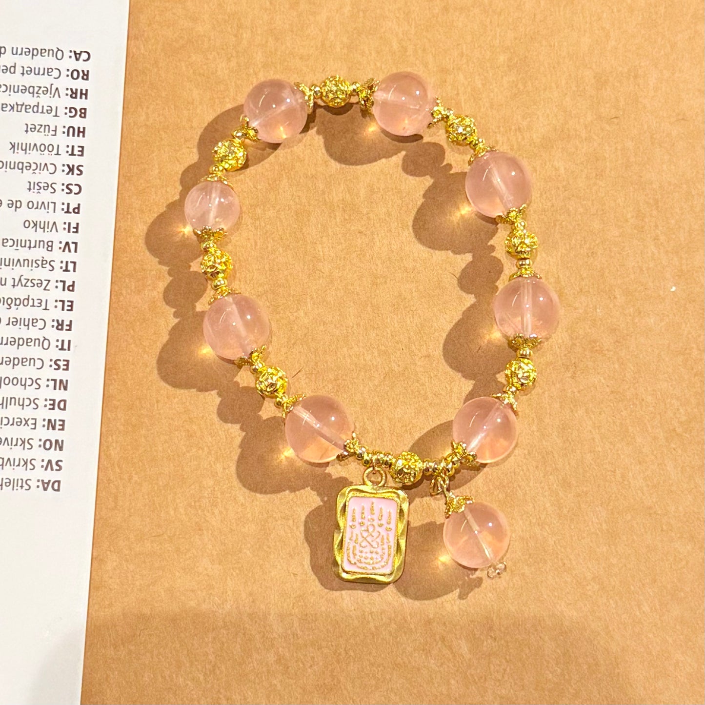 Charm Shield – Rose Quartz Bracelet with 14K Gold Pink Rune Talisman