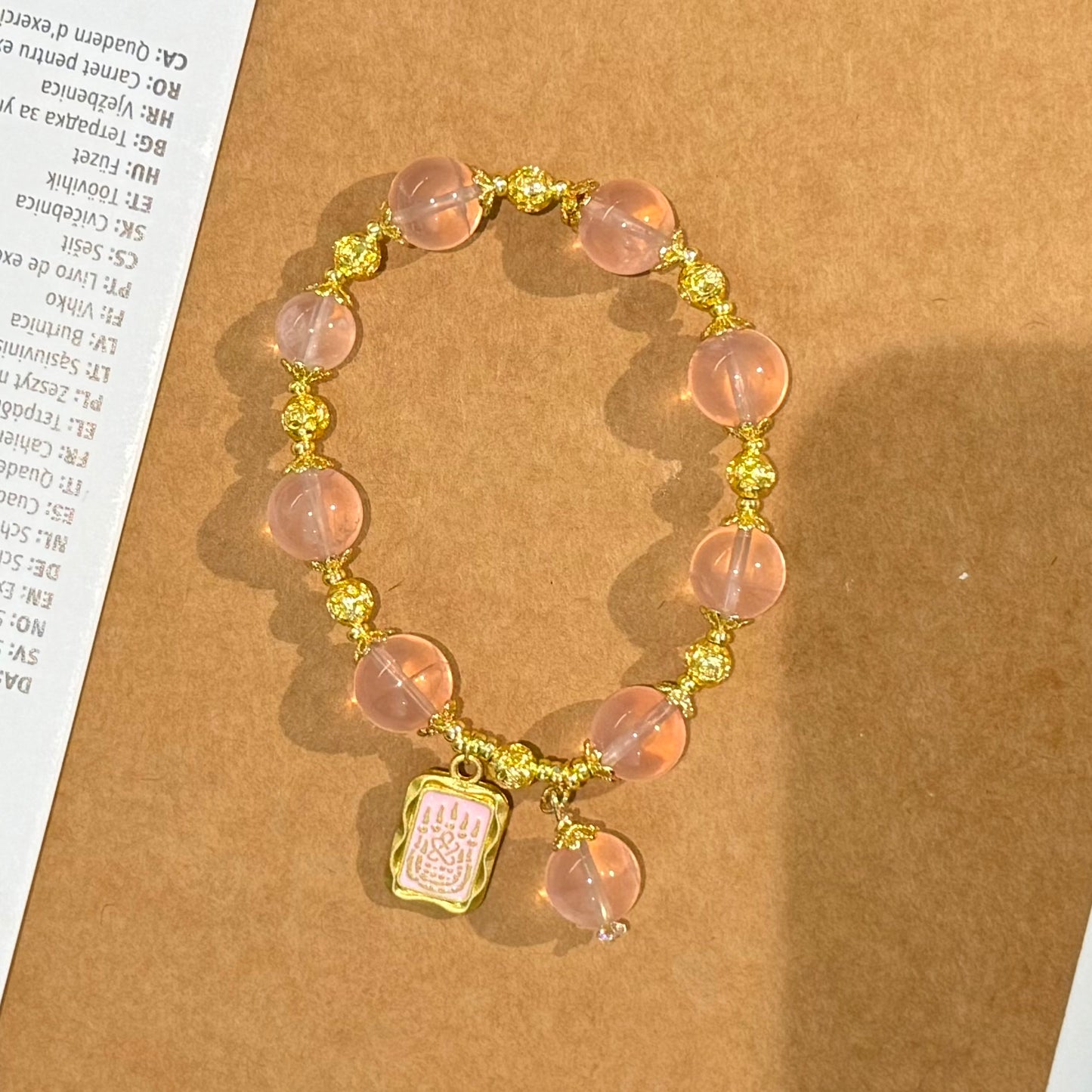 Charm Shield – Rose Quartz Bracelet with 14K Gold Pink Rune Talisman