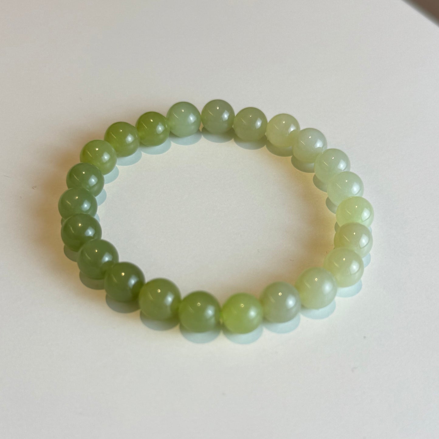 Empress Fortune – Hetian Jade Gradient Bracelet with Golden Rutilated Quartz & 14K Wealth Charm