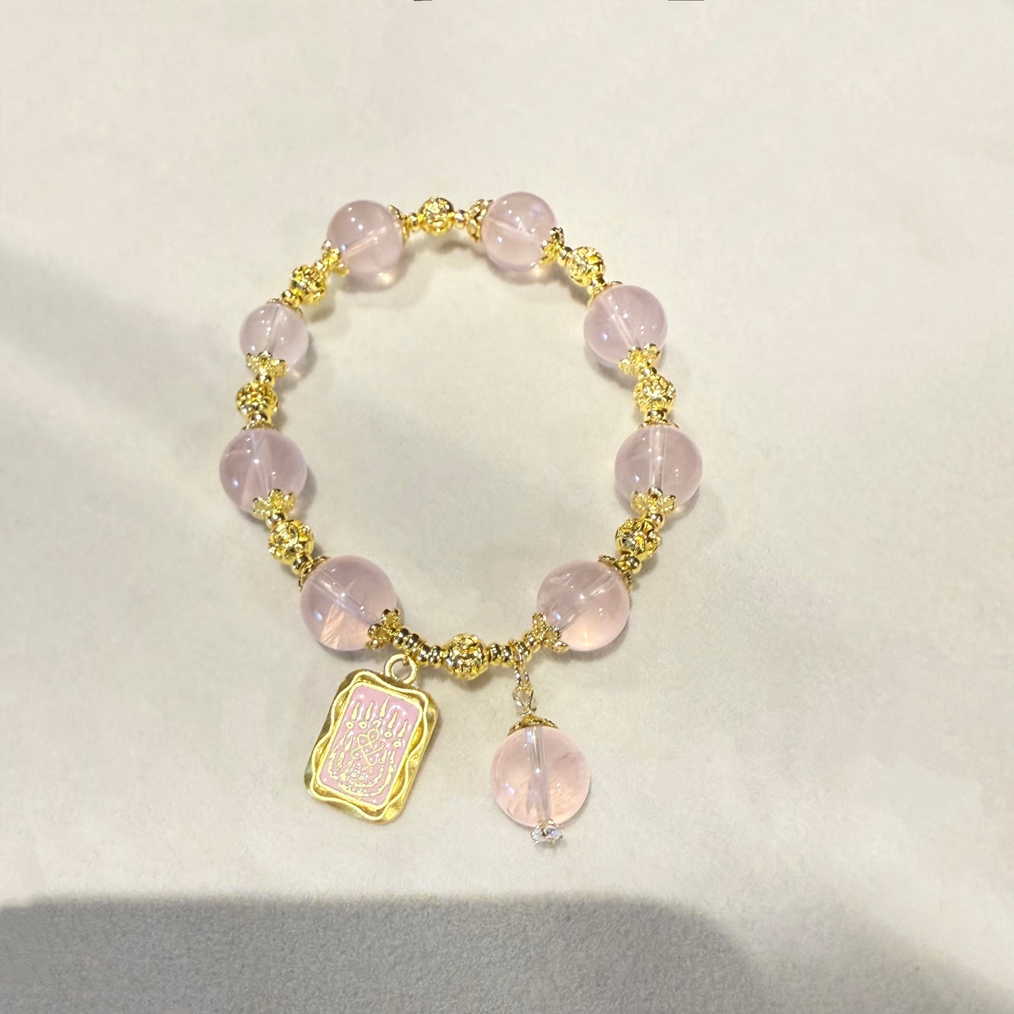 Charm Shield – Rose Quartz Bracelet with 14K Gold Pink Rune Talisman