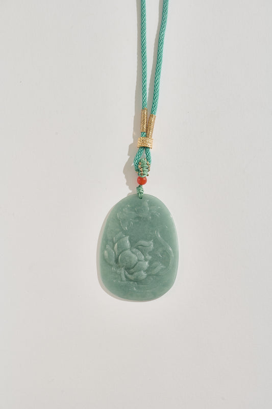 Lotus Serenity – Hand-Carved Jade Pendant Necklace with Silk Cord & Gold Details